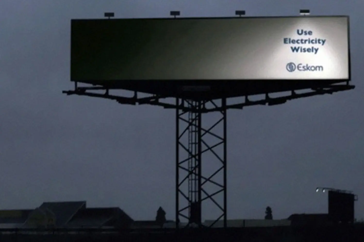 Ingenious Marketing Ads - Eskom ad with a dimly lit billboard promoting electricity conservation