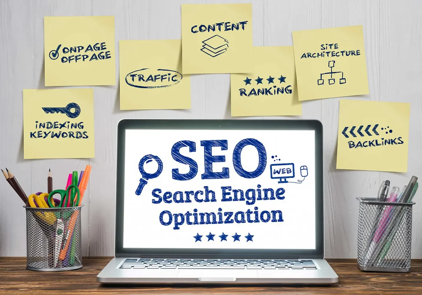 Laptop displaying SEO (Search Engine Optimization) strategies with notes on keywords, traffic, and content.